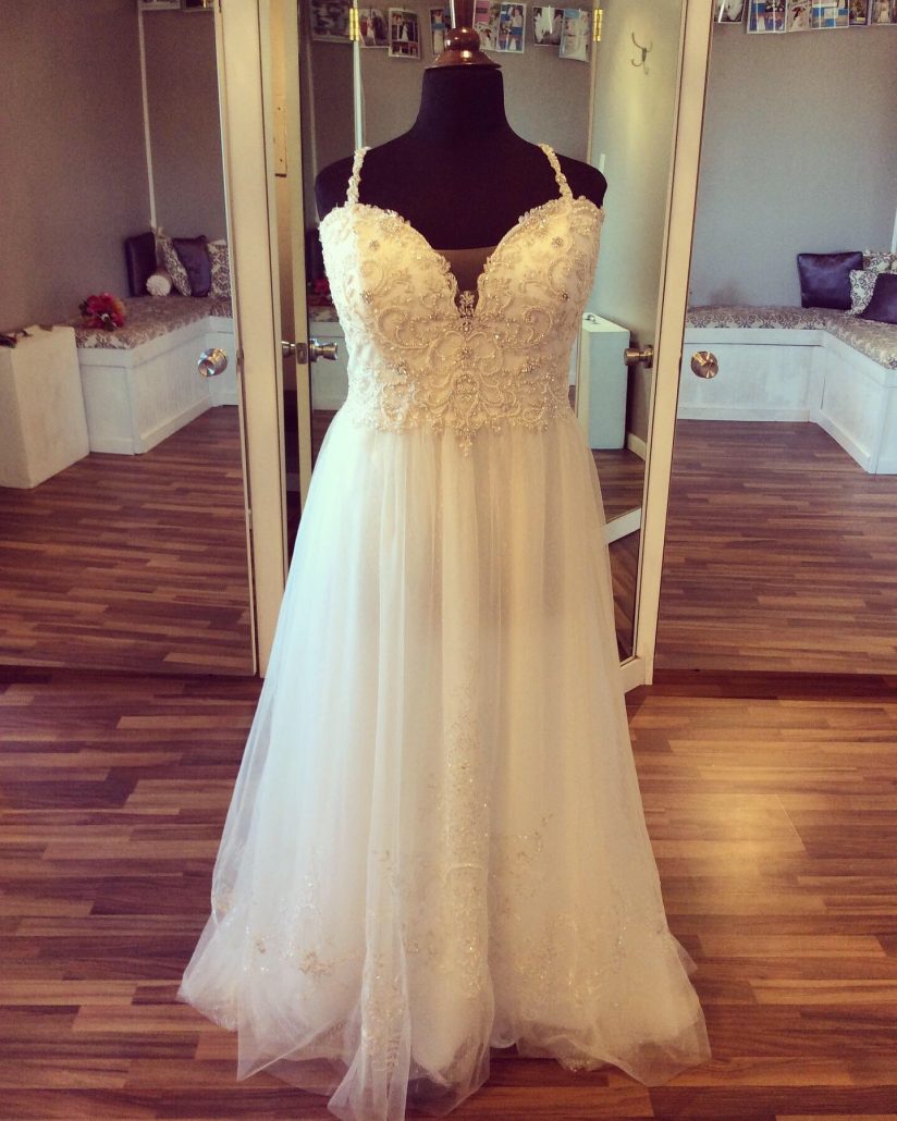 Beaded top bridal gown with straps